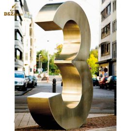 Golden 3 number art sculpture