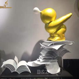 abstract figure is looking books modern sculpture for decor DZM 076