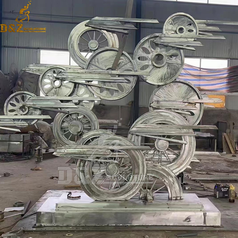 stainless steel abstract wheels in sculpture art modern Symbolic of the wheels of the times