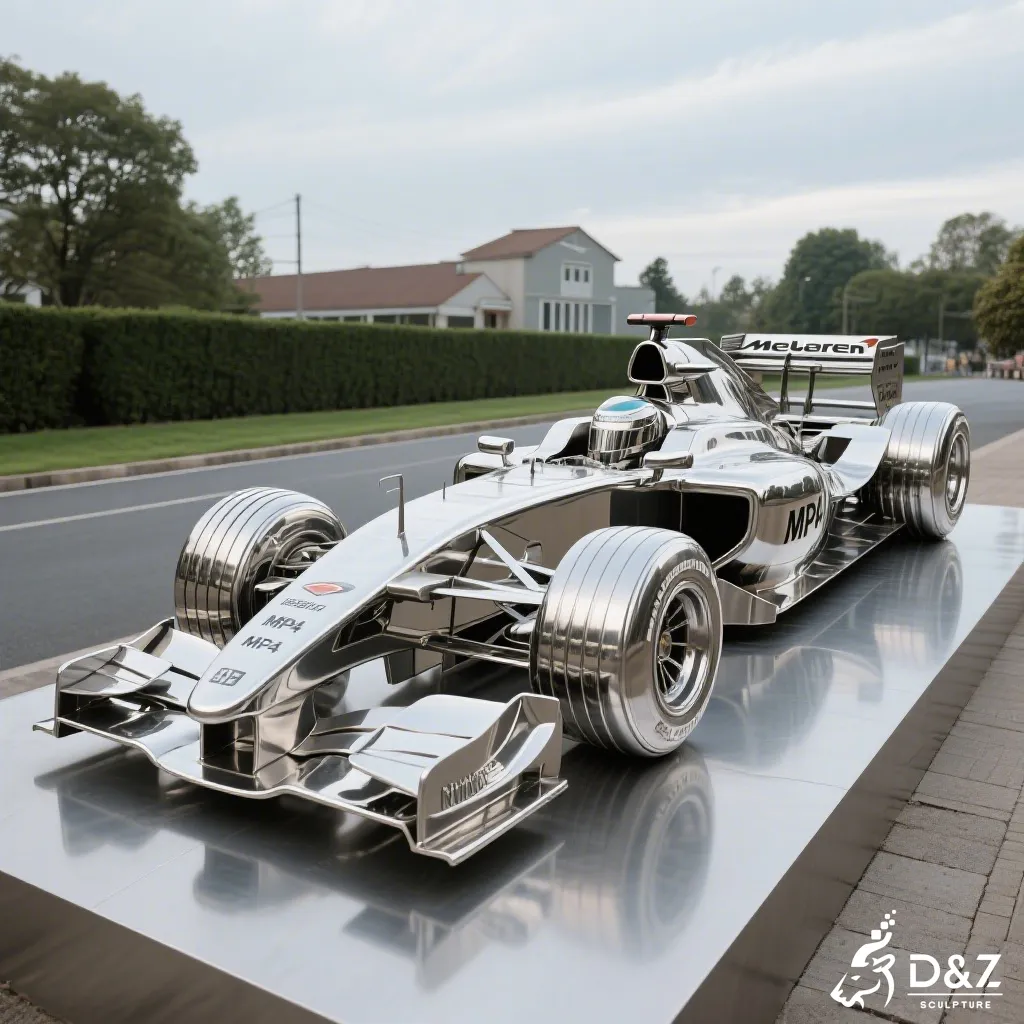 Life-size McLaren MP4/4 stainless steel F1 car sculpture on a luxury podium