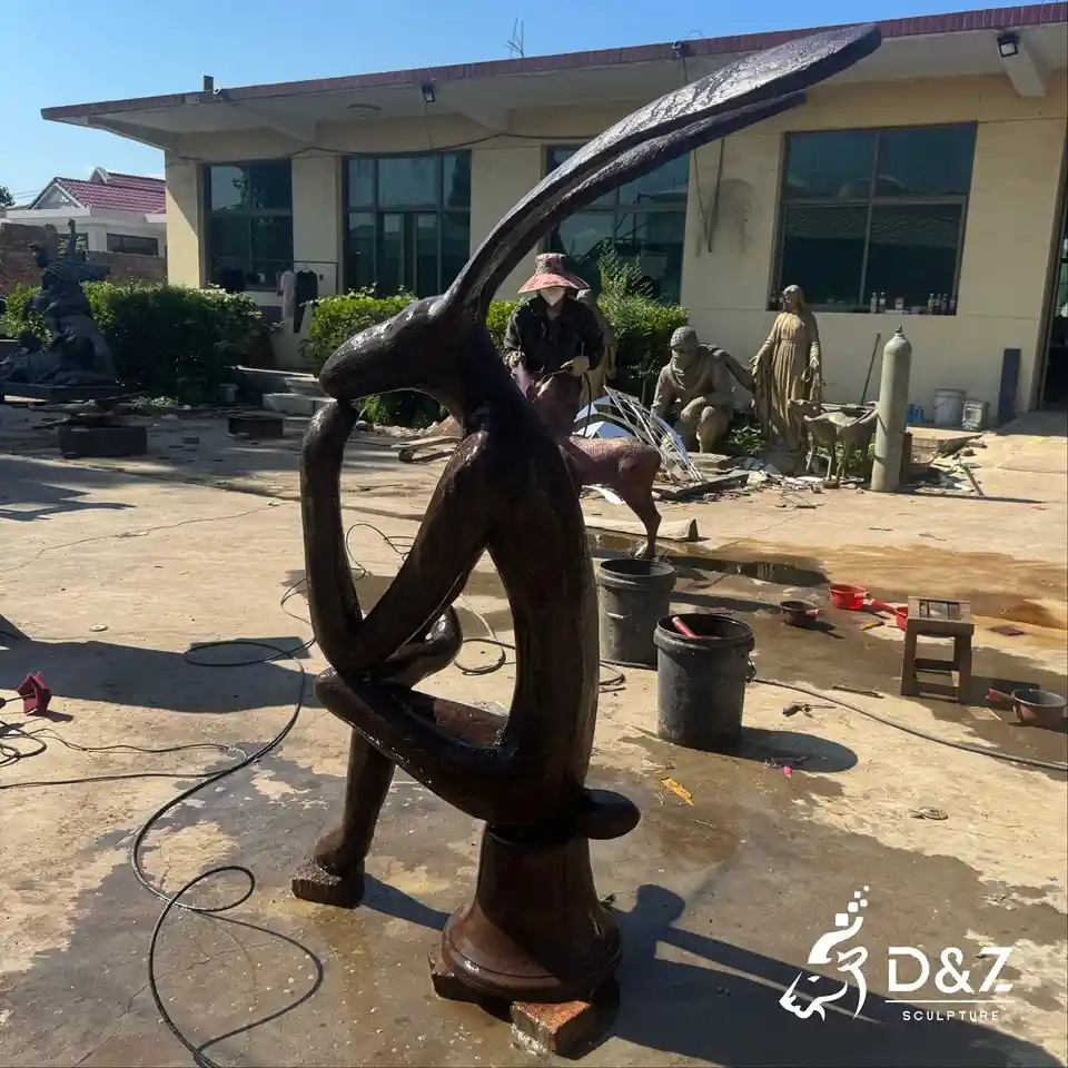 Bronze Thinking Rabbit Sculpture | Abstract Sitting Hare Statue For Outdoor Decor 5 Bronze Thinking Rabbit Sculpture | Abstract Sitting Hare Statue For Outdoor Decor 5