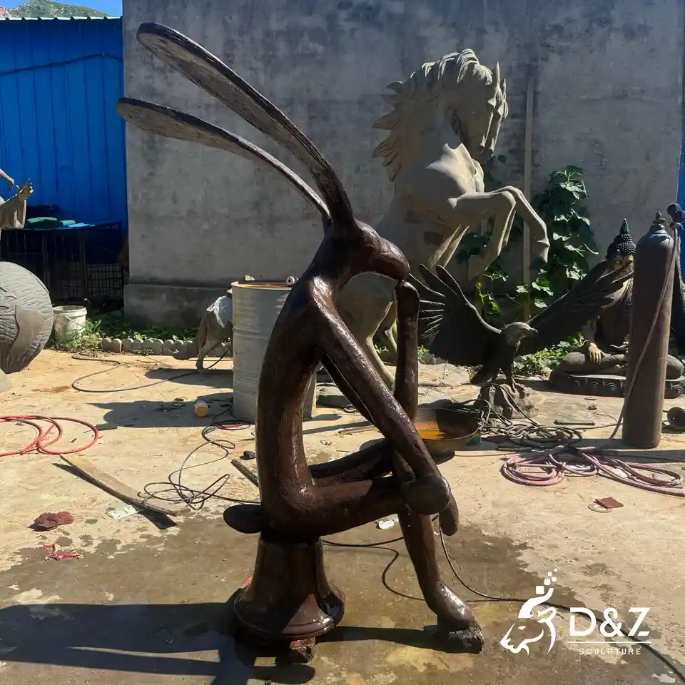 Bronze Thinking Rabbit Sculpture | Abstract Sitting Hare Statue For Outdoor Decor 7 Bronze Thinking Rabbit Sculpture | Abstract Sitting Hare Statue For Outdoor Decor 7