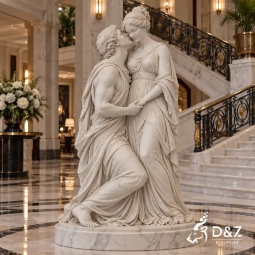 Lovers adoration kiss sculpture with a kneeling man kissing a woman in a luxury hotel lobby