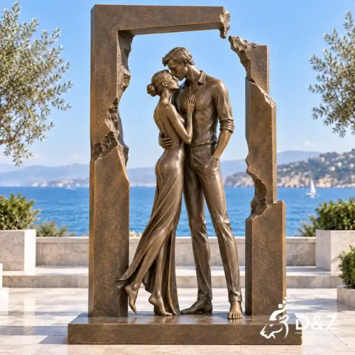 The kiss modern art sculpture featuring bronze kissing couple in a broken doorway frame