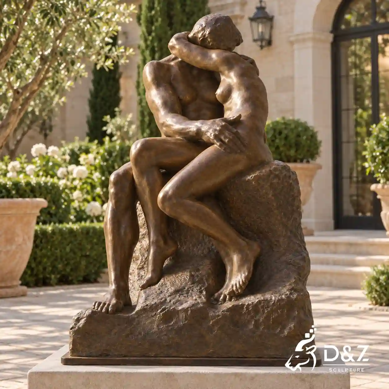 The Kiss sculpture analysis featuring a bronze kissing couple