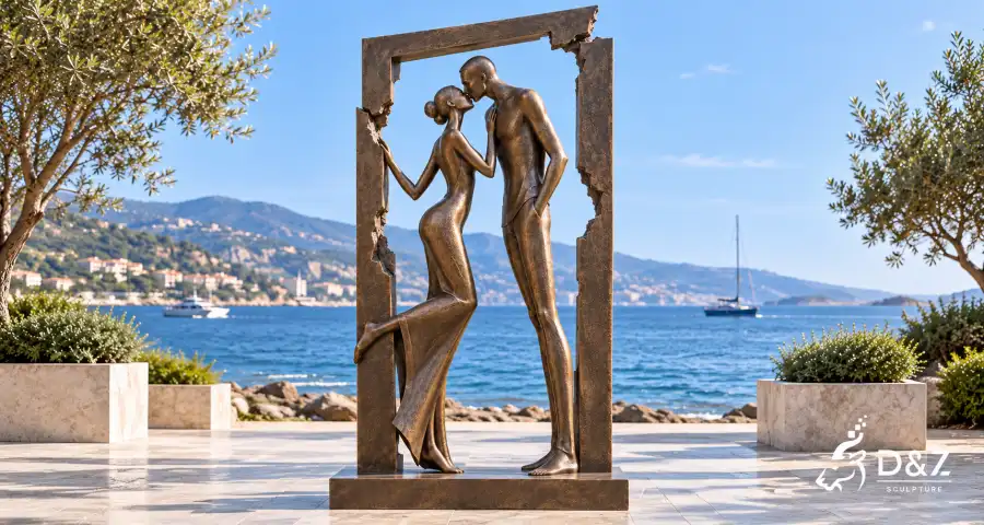 Framed bronze kissing couple sculpture